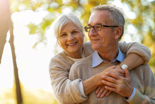 senior couple outdoors in Fall