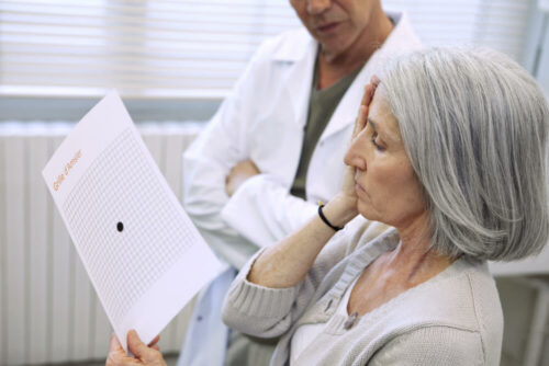 Woman looking at amsler grid