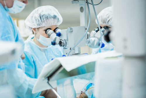 Surgeon performing eye surgery