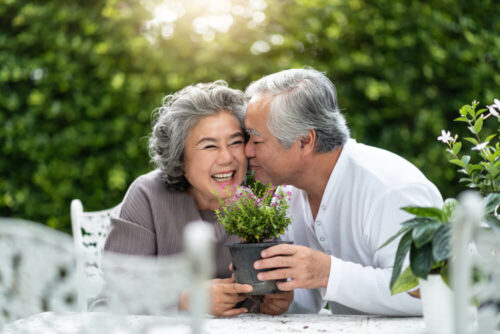 Cute older couple outdoors and laughing