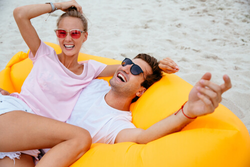 Couple smiling on raft