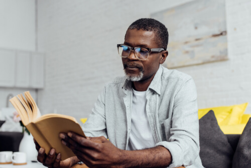 Elderly man reading about Diabetic Retinopathy