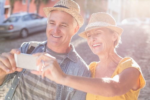 Elderly couple taking a selfie