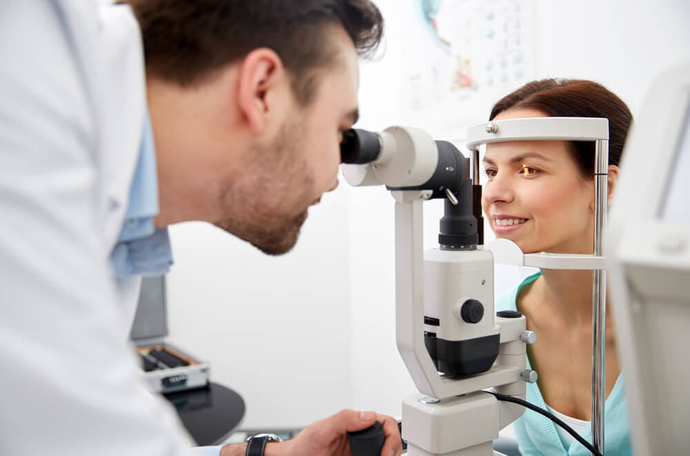 Doctor giving an eye exam