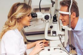 Doctor giving an eye exam