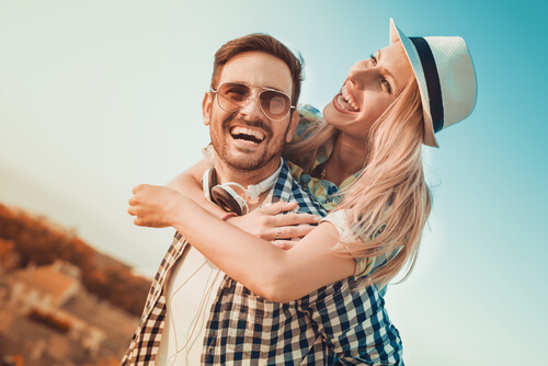 Happy couple smiling after visiting their ophthalmologist